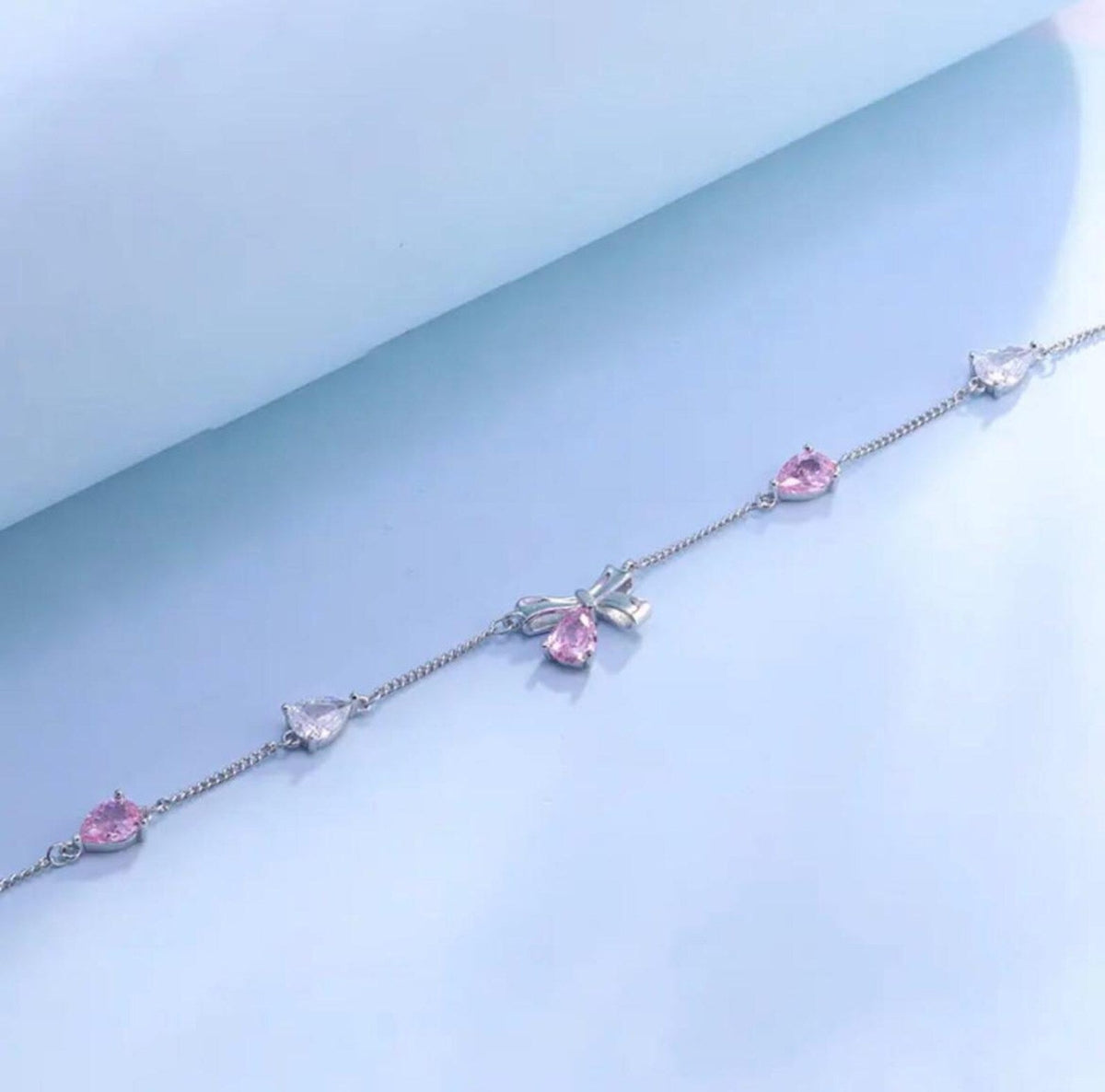silver bow crystal charm pink white teardrop.