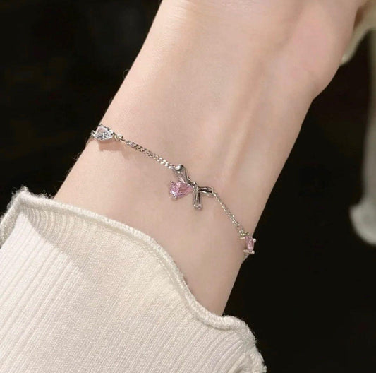 Flowra silver bow crystal charm pink white teardrop.