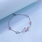 Flowra silver bow crystal charm pink white teardrop.