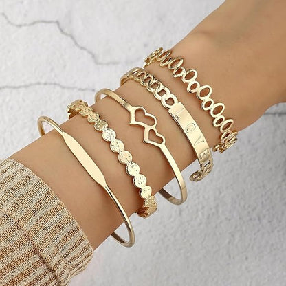 Stackable gold bangle set non‑tarnish cuff bracelets.